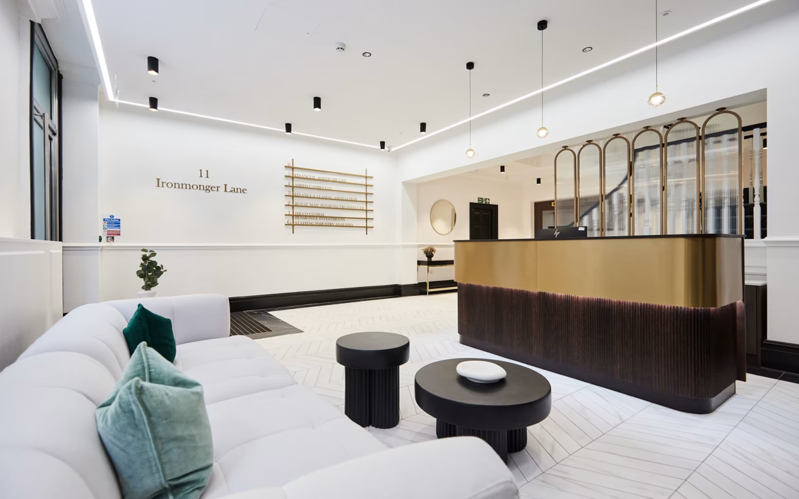 11 Ironmonger Lane reception with linear lighting and pendant fittings