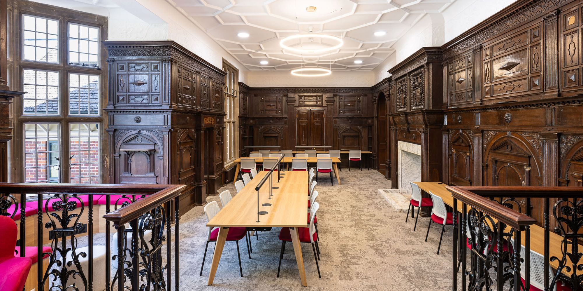 Wycombe Abbey School study room with illuminated circular pendants